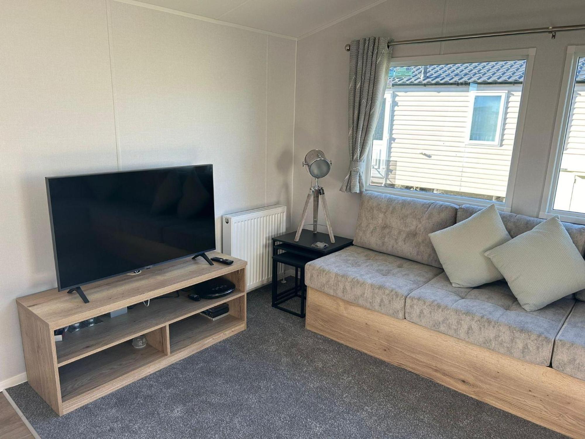 Campsite Beautiful 8 Berth Caravan With Decking At Naze Marine Ref 17344br